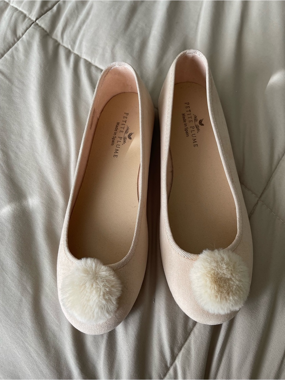 Petite Plum Women's Cream Ballet Flats with Pom Pom